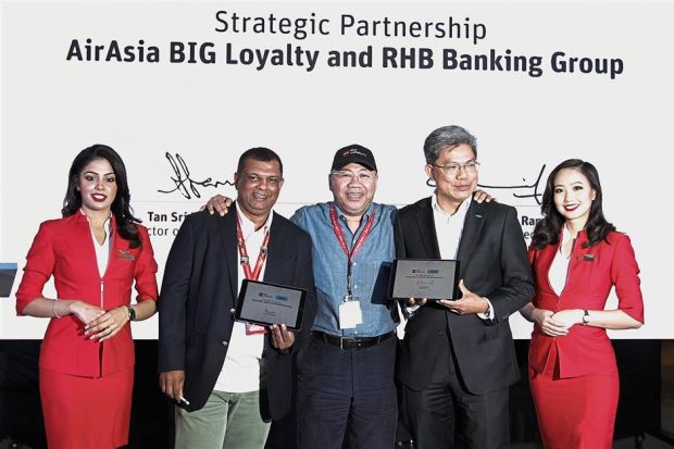 RHB Banking Group and AirAsia tie up in loyalty programme
