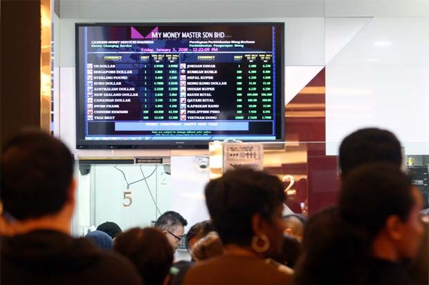 Ringgit opens lower against US$ on heightened trade tensions