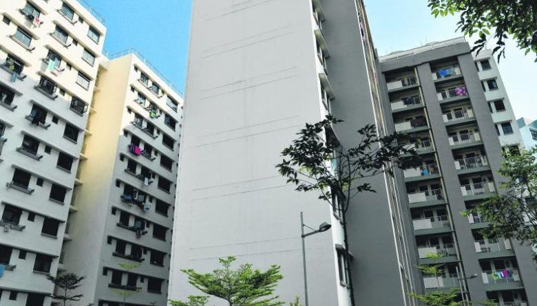 How much cheaper are flats in Johor compared to Singapore?
