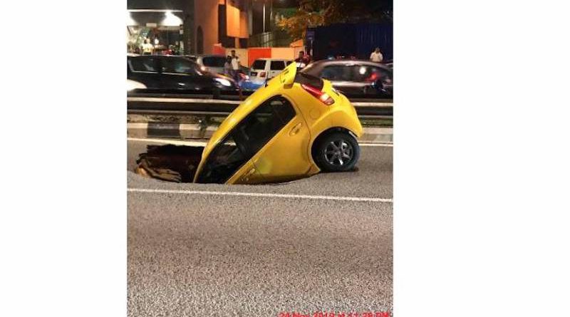 Car falls into sinkhole in Kuala Lumpur