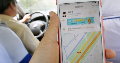 Coronavirus fears prompt Chinese ride-hailing app DiDi to install protective sheets in vehicles and give masks to drivers