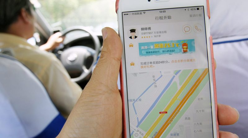 Coronavirus fears prompt Chinese ride-hailing app DiDi to install protective sheets in vehicles and give masks to drivers